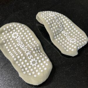 pair of light, green yoga, socks, fits size 8 shoe stretchy  tried on